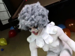 Sexy babe wears clown makeup and teases
