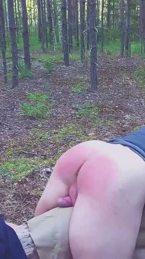 Spanking husband in the forest   Clip 2