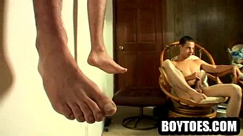 Two hunks showing their feet and jerking off