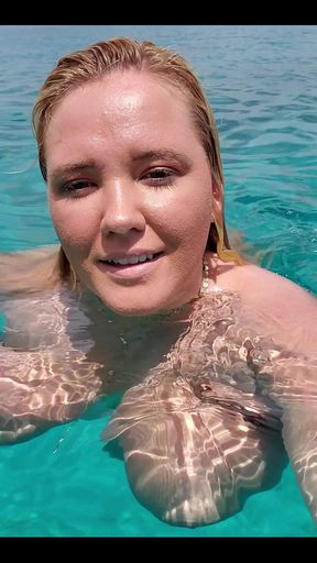Swimming in the blue waters of Greece butt naked...