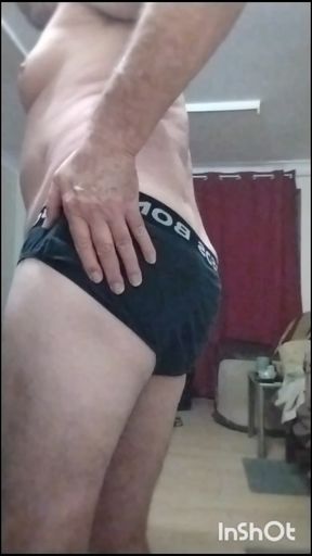 Older guy taking off his jeans and jocks cos he wants to feel his cock in the night air. Shakin&#039; his slackie