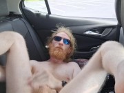 Sweaty ginger in car is too hot for his clothes and jacks off naked
