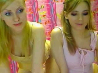 Appetizing webcam lesbians rubbing each other's pussies