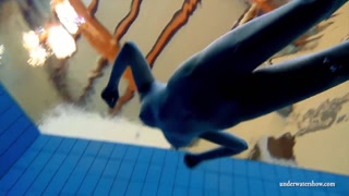 Big tits teen Lucie in the pool