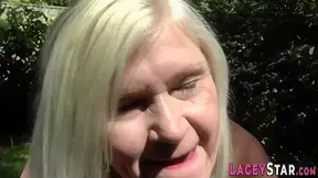 Busty grandma sucking cock