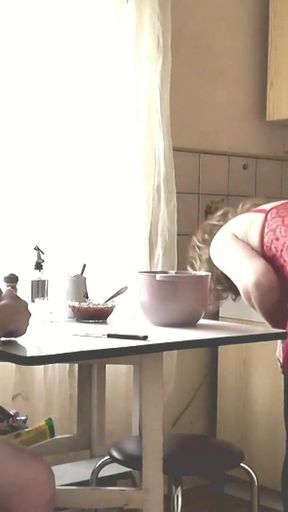 Captivating moment from &quot;Adult woman blonde in transparent negligee and beautiful cute brunette naked girl cooks in kitchen&quot;