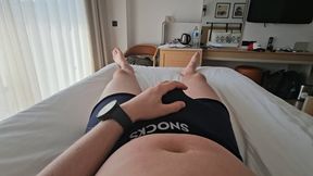 Young man jerking off in hotel room