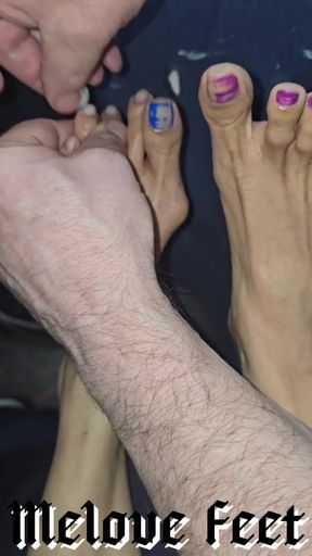 Melove 2 Nail Polish Colors on Her Small Feet