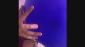 Dani blows up and sit pops blue balloon copy