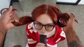 Cute nerdy redhead sucks a giant black cock and swallows it all the way to the base