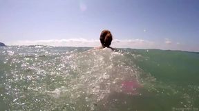 Nude BBW playing in the sea