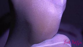 MILF shows off her shiny pantyhose feet