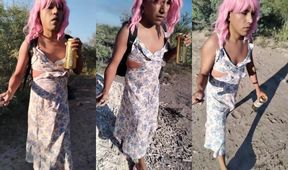 Petite femboy in pink dress walks in public while flashing big ass
