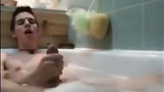 Twink jerking off in bathtub 4