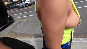Public stroll with exposed breast and slip revealing cleavage