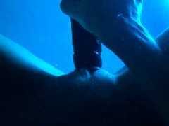 Horny milf drilling shaved pussy with big toy underwater