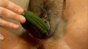 Ugly fat granny Julie has a masturbation fun with huge cucumber