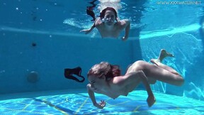 Jessica & Lindsay swim naked in the pool