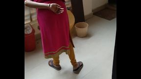 Boy rubbing his pennies infront of maid