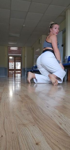 Sweat, focus, fire—gi top off and practice rolls on.