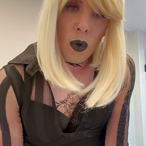 Femboy with blonde hair and black lipstick