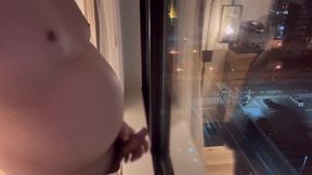 Married chubby guy jerks off naked near hotel window