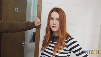 Gorgeous redhead fucks for money in a public toilet