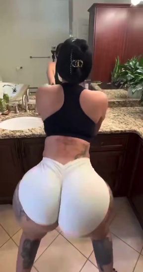 Female Onlyfans Model in Kitchen