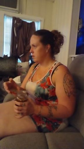 Pretty girl smokes in night dress on the couch part 3