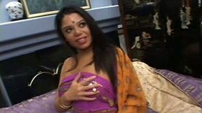 Big tittied Indian brunette MILF flaunts her tits and gives head