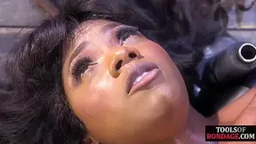 BDSM sub ebony suffers feet torment in predicament bondage