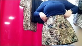 Mature milf tries on skirts in the mall on her big ass