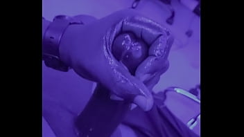 Stroking under blue lights at night