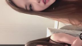 Asian girls Risi and her best friend Luxy wear leather fetish-style uniforms, black stockings, and red high heels, smoking constantly and teasing you.