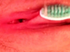 massaging my leaky pussy with a toothbrush
