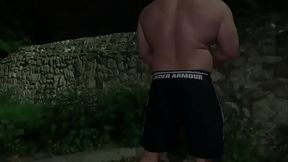 Muscle flexing after gym in the carpark