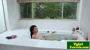 Chesty shemale masturbating in the bathtub