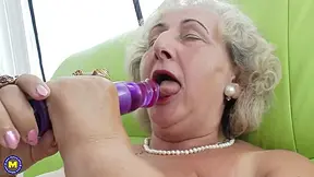 Mature Grandma Playing With A Purple Dildo