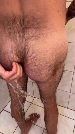 Shower ass at the bathroom