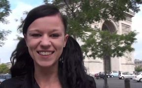 Vanessa , a pretty brunette, shows off on the Champs Elysees