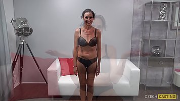 Mature brunette, Klaudie is sucking cock during a porn video casting, to warm up her partner