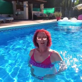 Just me, in a bikini, splashing about in a pool on holiday in Spain