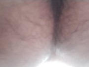 A hairy Japanese man squats and masturbates. The contraction of his anus at moment of ejaculation