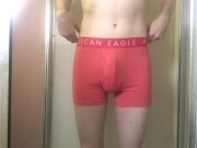 College Twink Pissing in Pink Trunks and Getting Hard