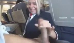 stewardess blonde plane handjob cumshot