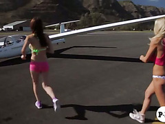Busty playmates try out ultralight plane and boat ride naked