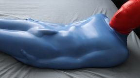 Vacuum packed in skintight blue latex