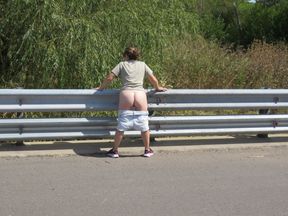 Patricia on the bridge over the road