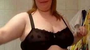 Fat redhead mature lady is proud of her big boobies