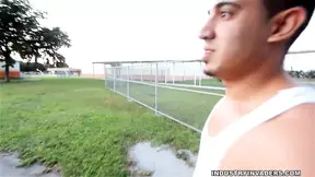 Slim couple practices soccer in the bedroom